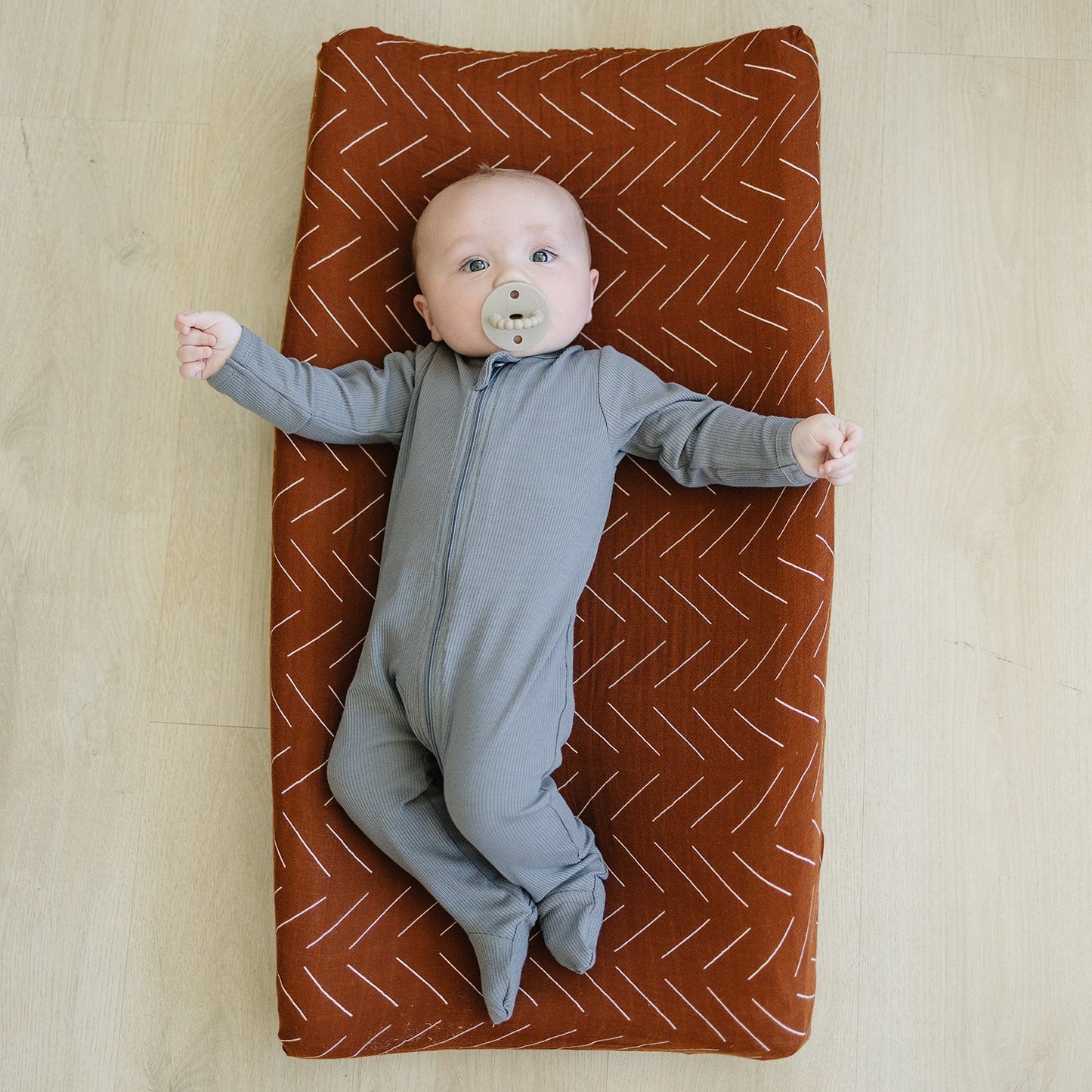 muslin changing pad cover // rust mudcloth