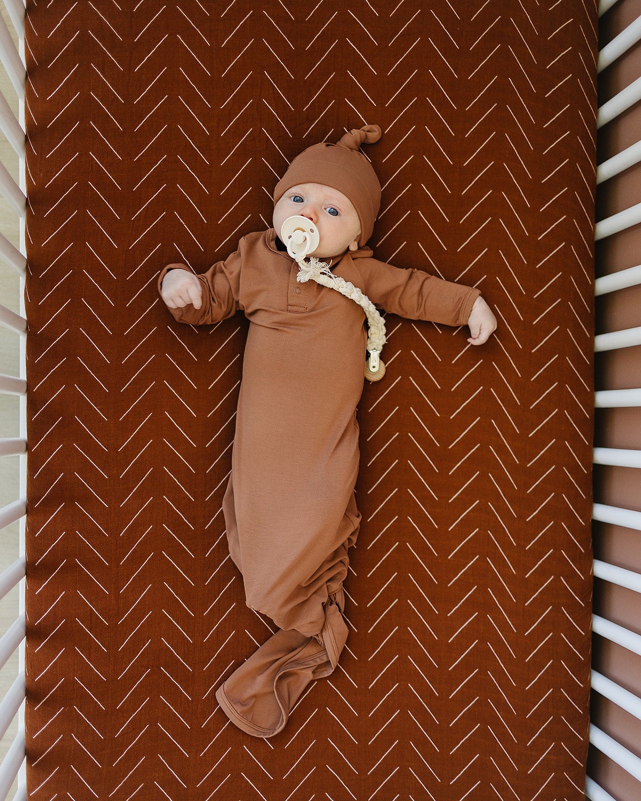 muslin crib sheet // rust mudcloth