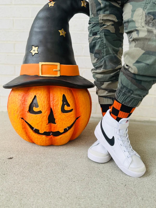 orange + black checkerboard socks