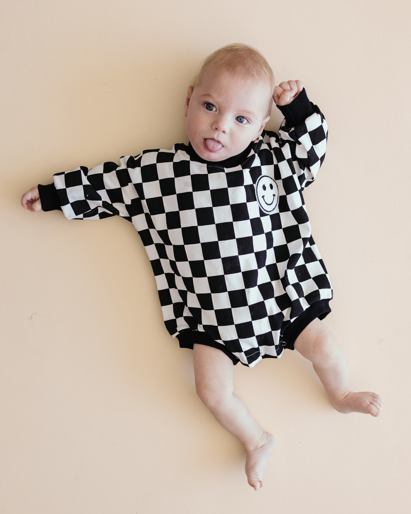 bubble romper // checkered smiley black