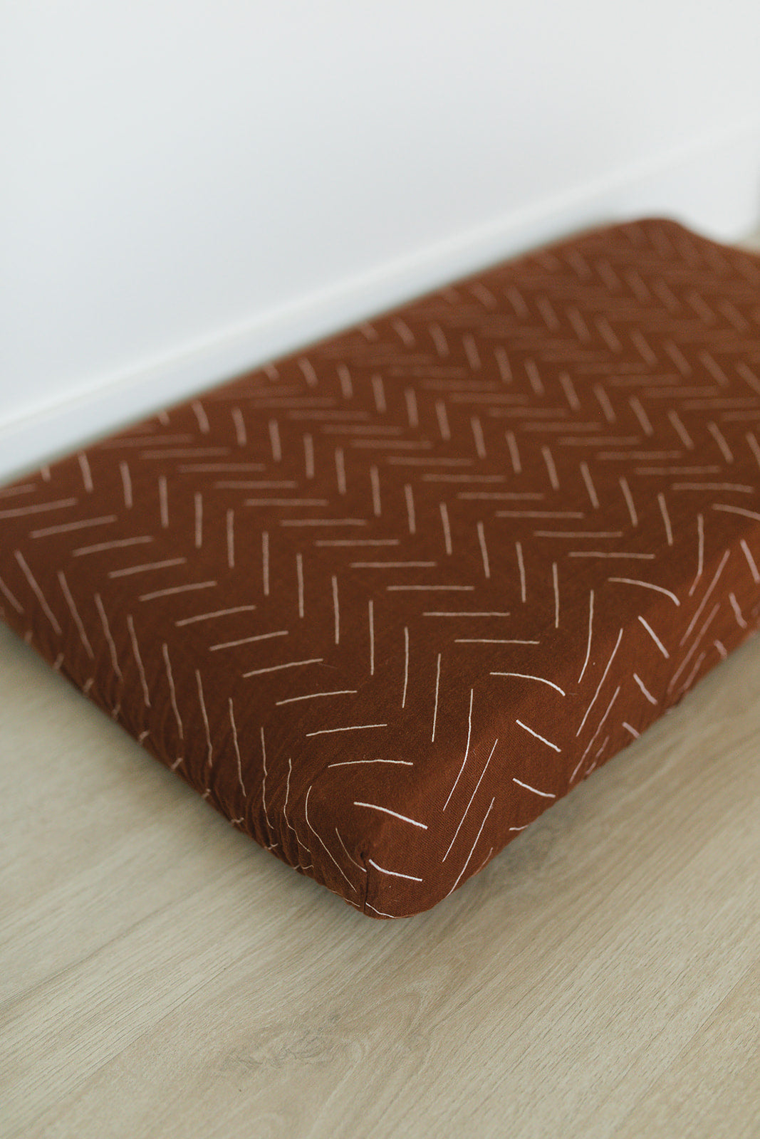 muslin changing pad cover // rust mudcloth