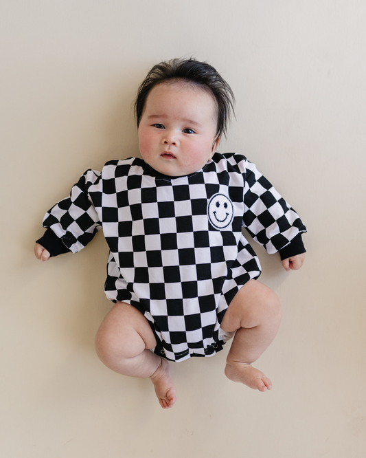 bubble romper // checkered smiley black