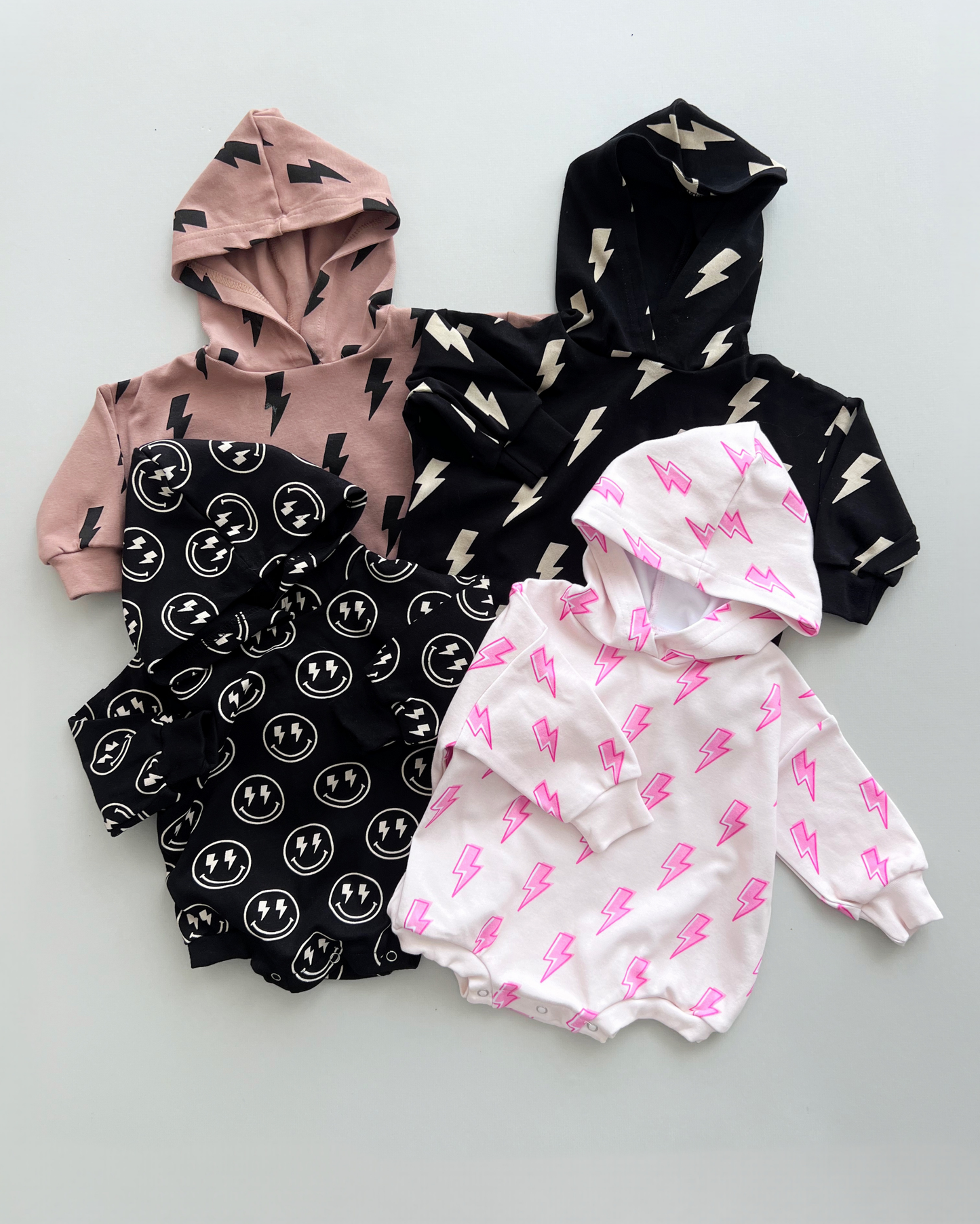 hooded bubble romper // black bolts