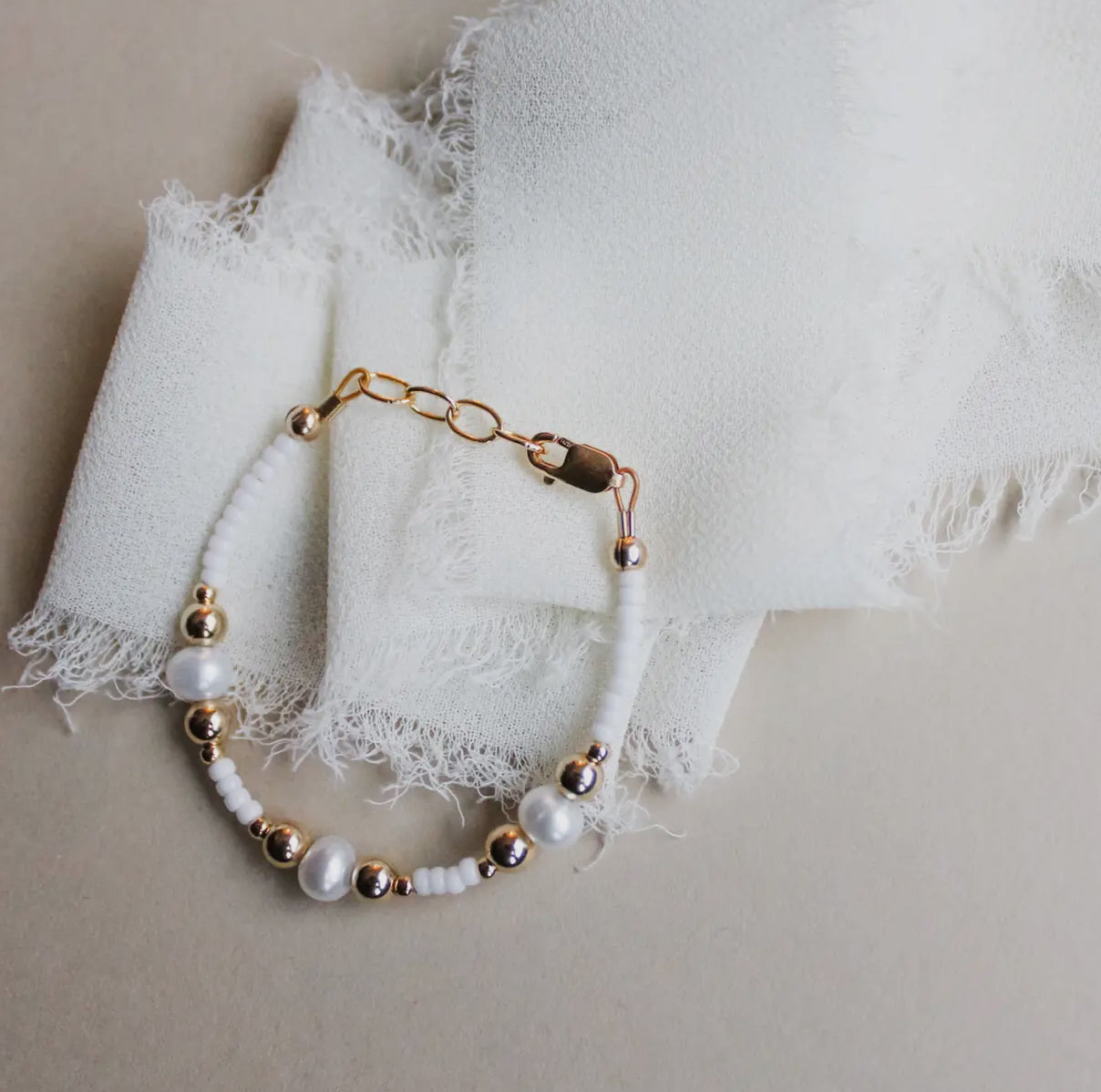 baby/toddler bracelet // pearls, whites, + golds