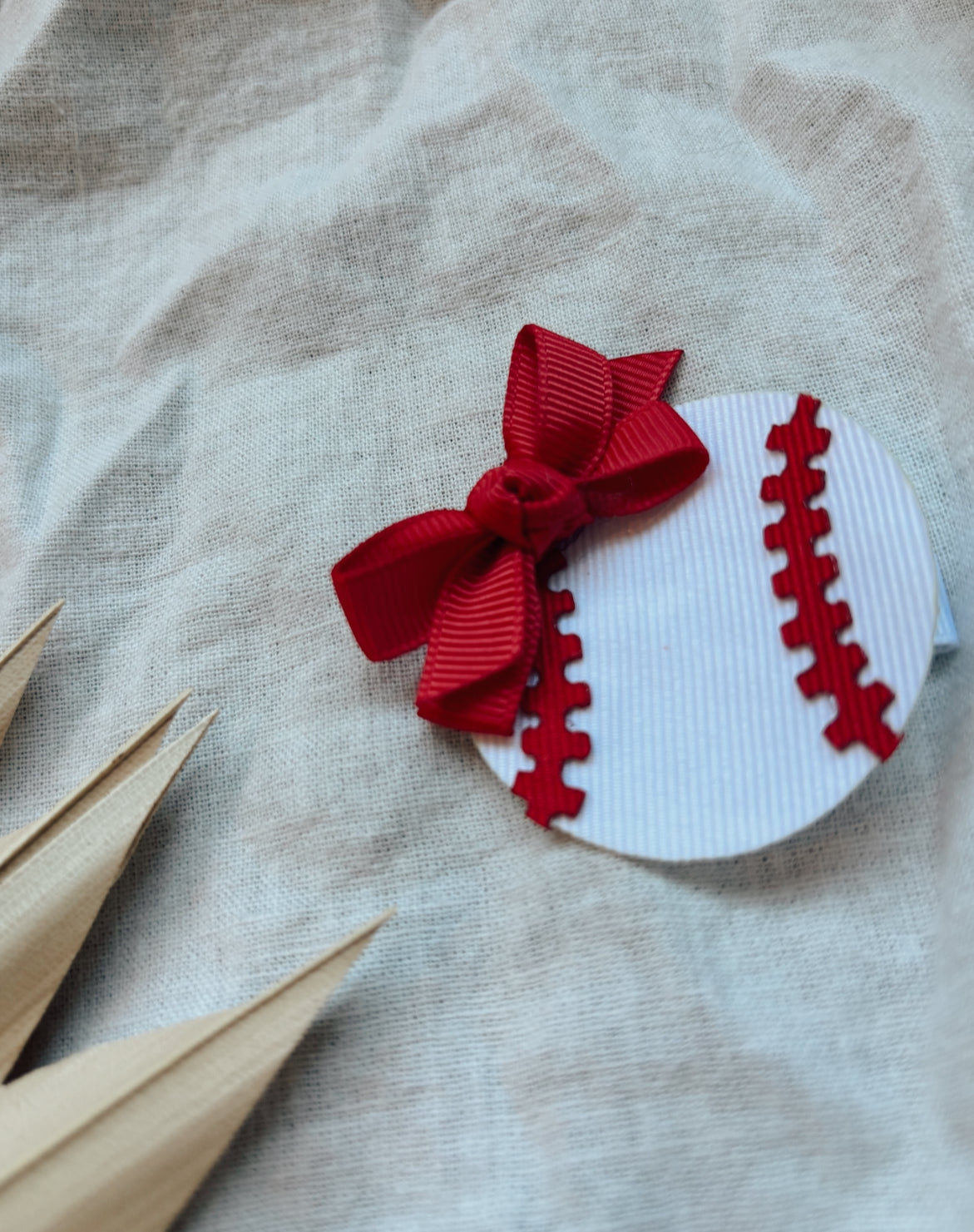 red baseball bow