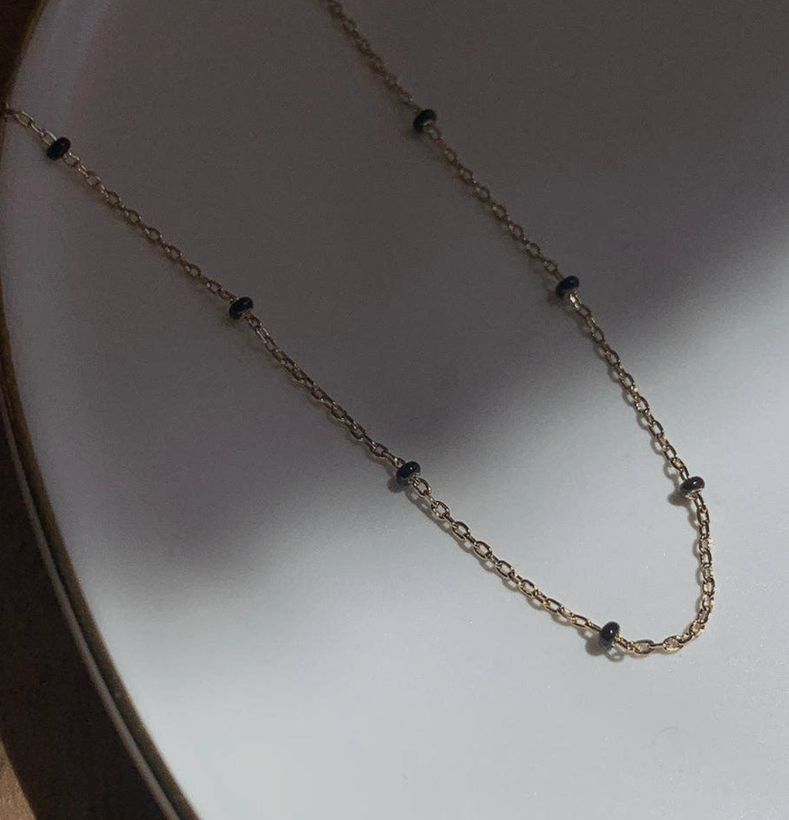 dainty black beaded necklace