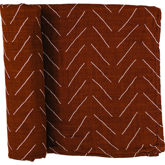muslin swaddle blanket // rust mudcloth