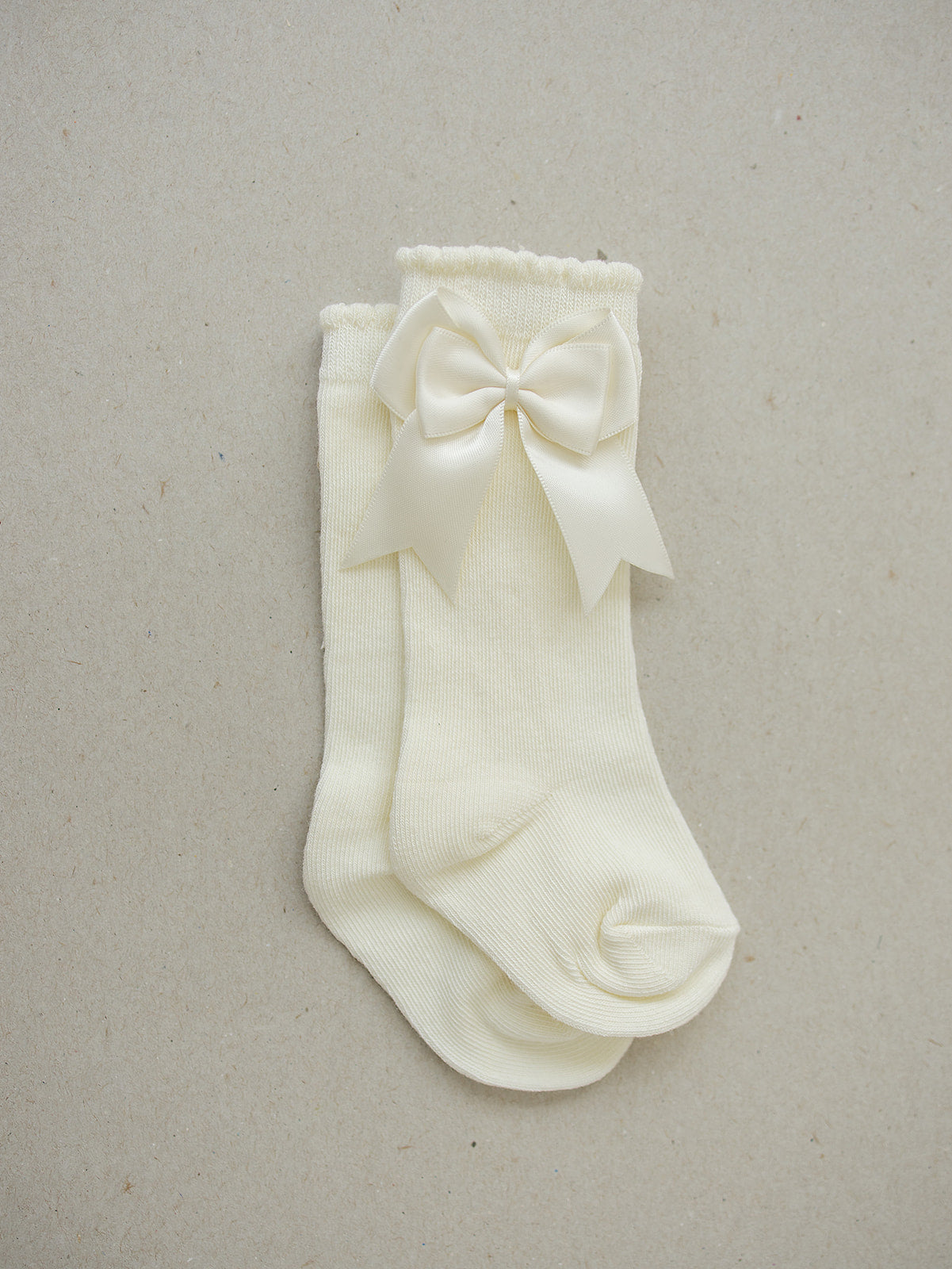 high-rise bow socks