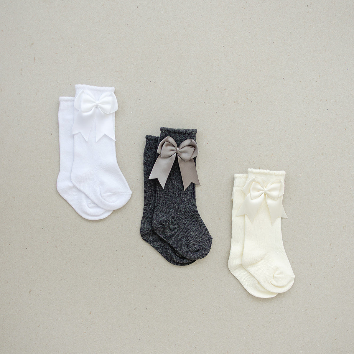 high-rise bow socks