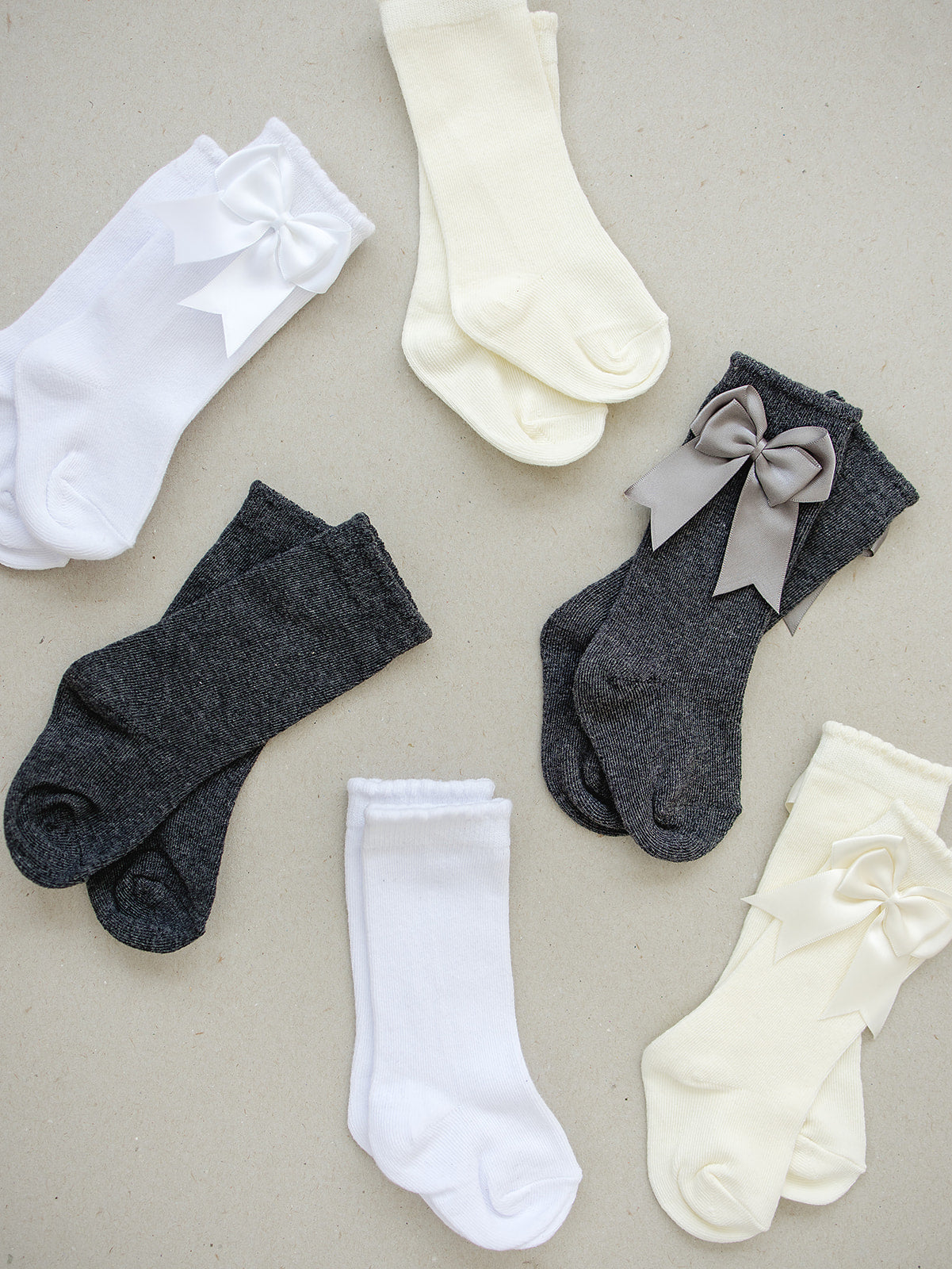 high-rise bow socks