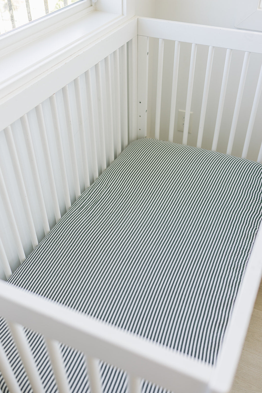 muslin crib sheet // green stripes