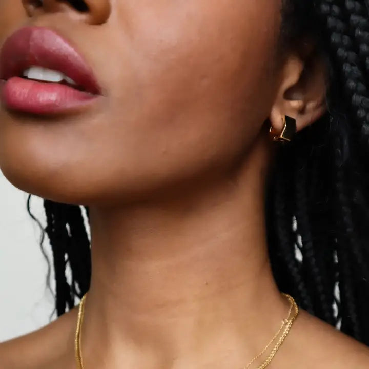 gold hexagon huggie hoop earrings