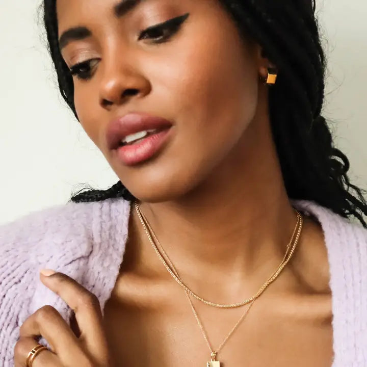 gold hexagon huggie hoop earrings