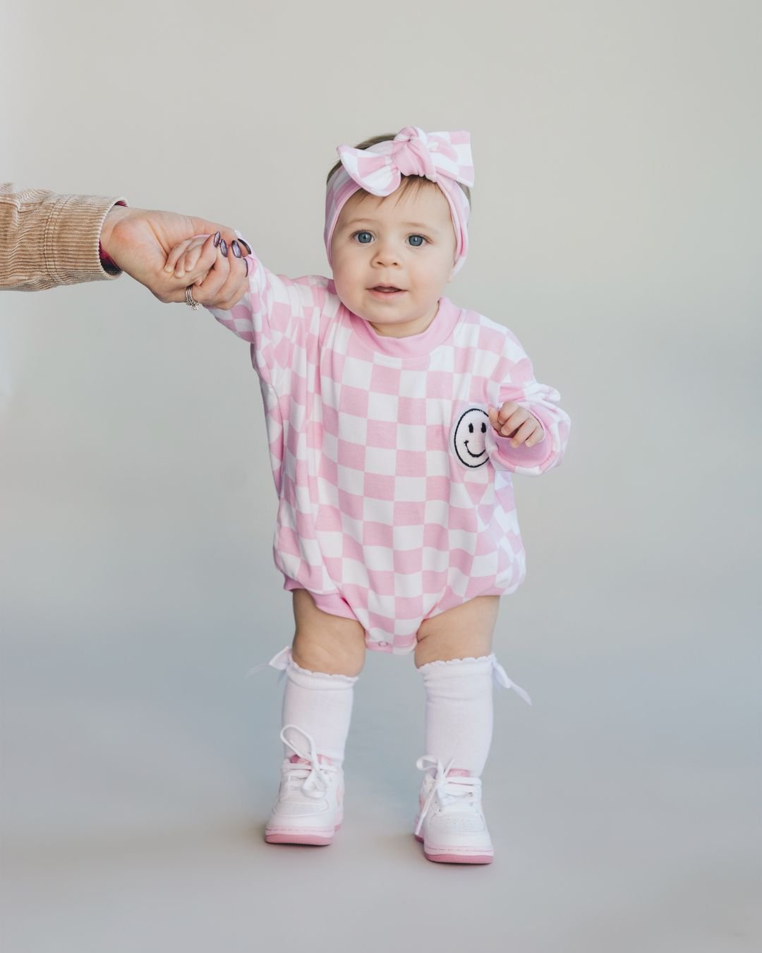 bubble romper // checkered smiley pink