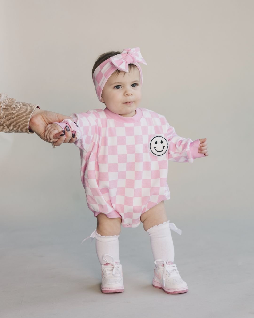 bubble romper // checkered smiley pink