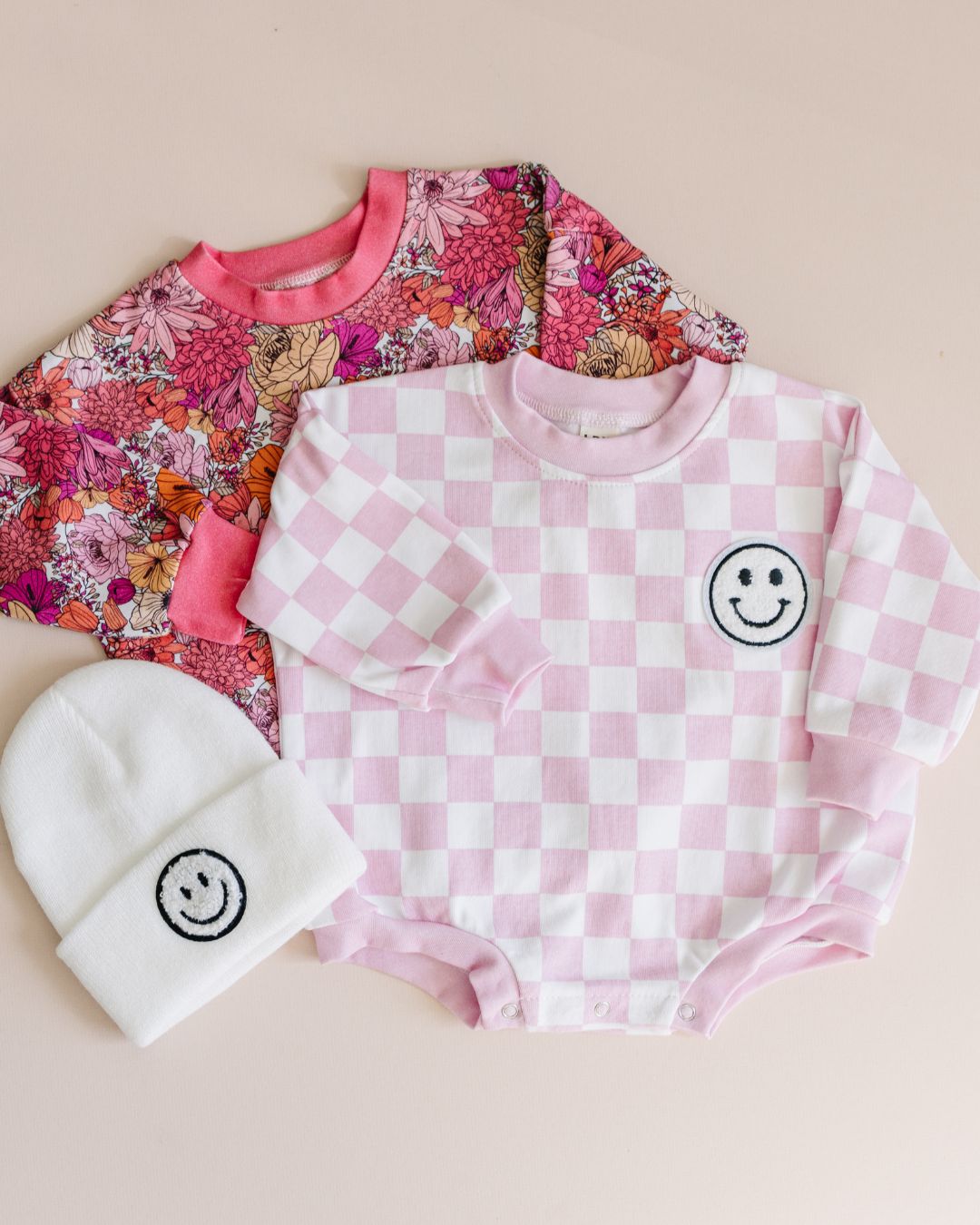 bubble romper // checkered smiley pink