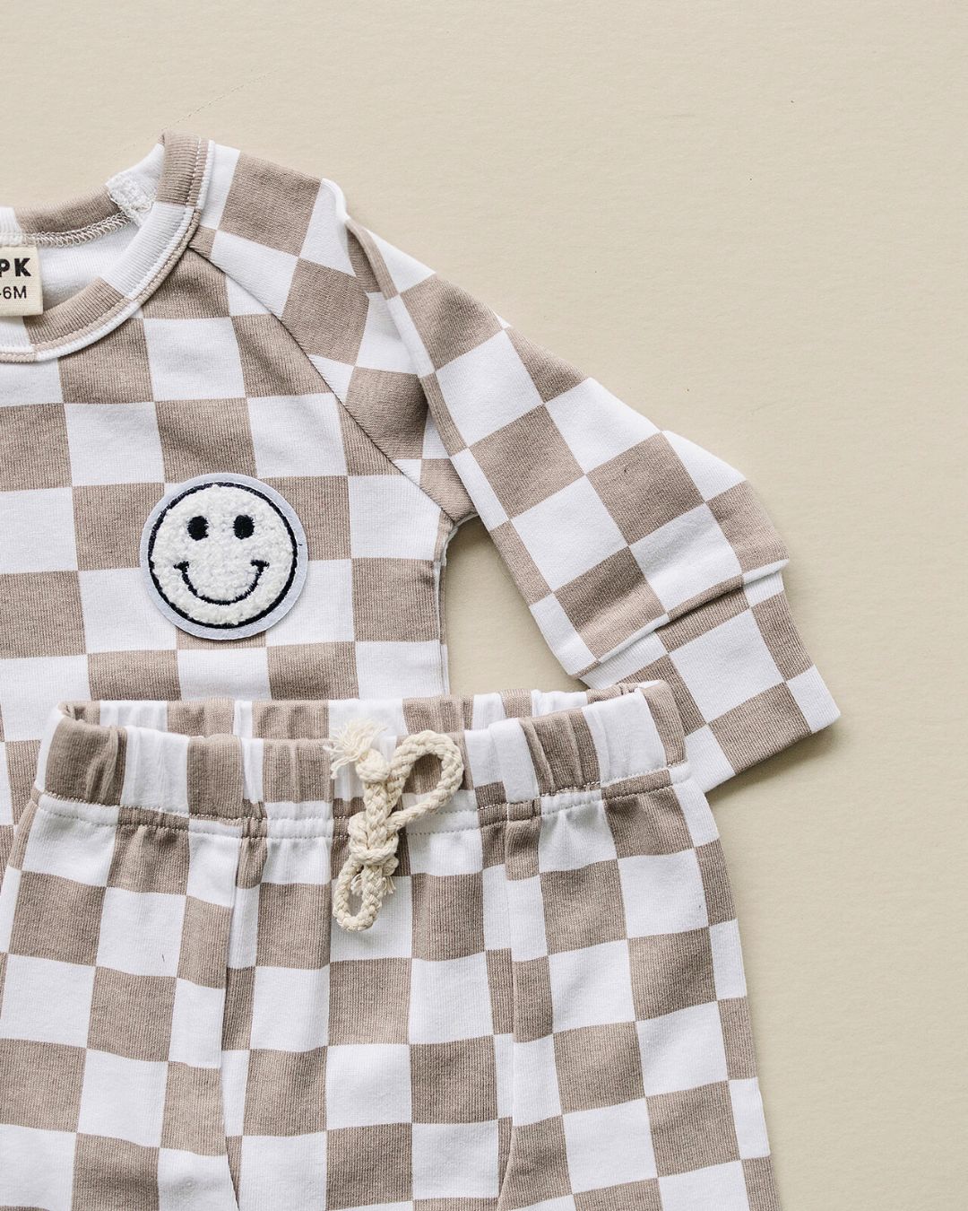 checkered smiley lounge set // latte