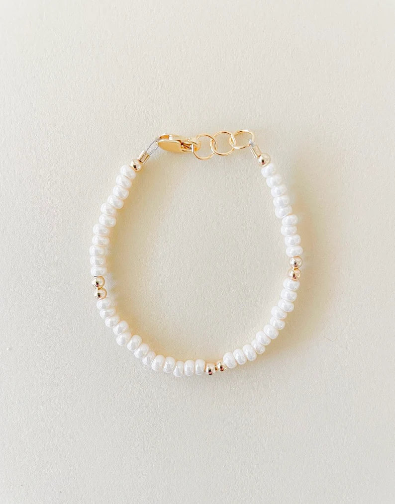 baby/toddler bracelet // cream + gold accents