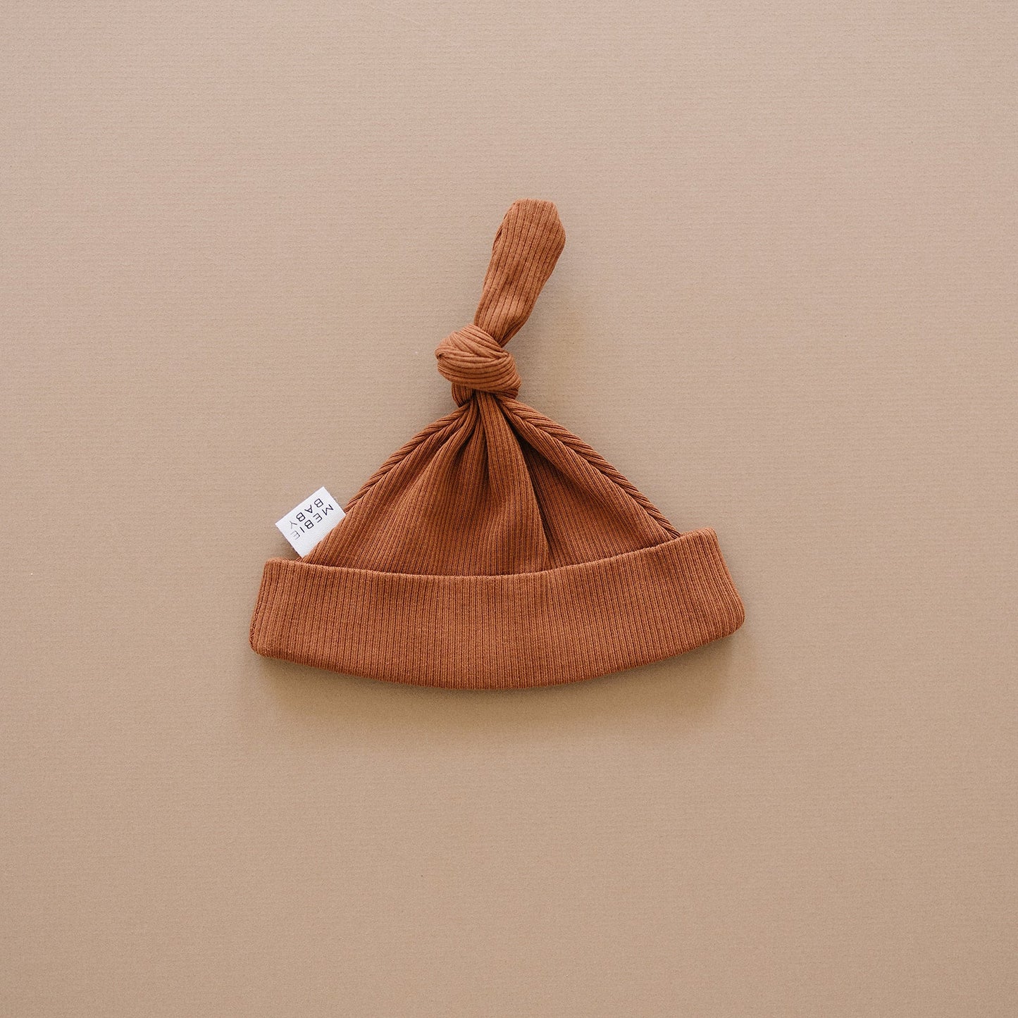 organic ribbed cotton newborn knot hat // rust